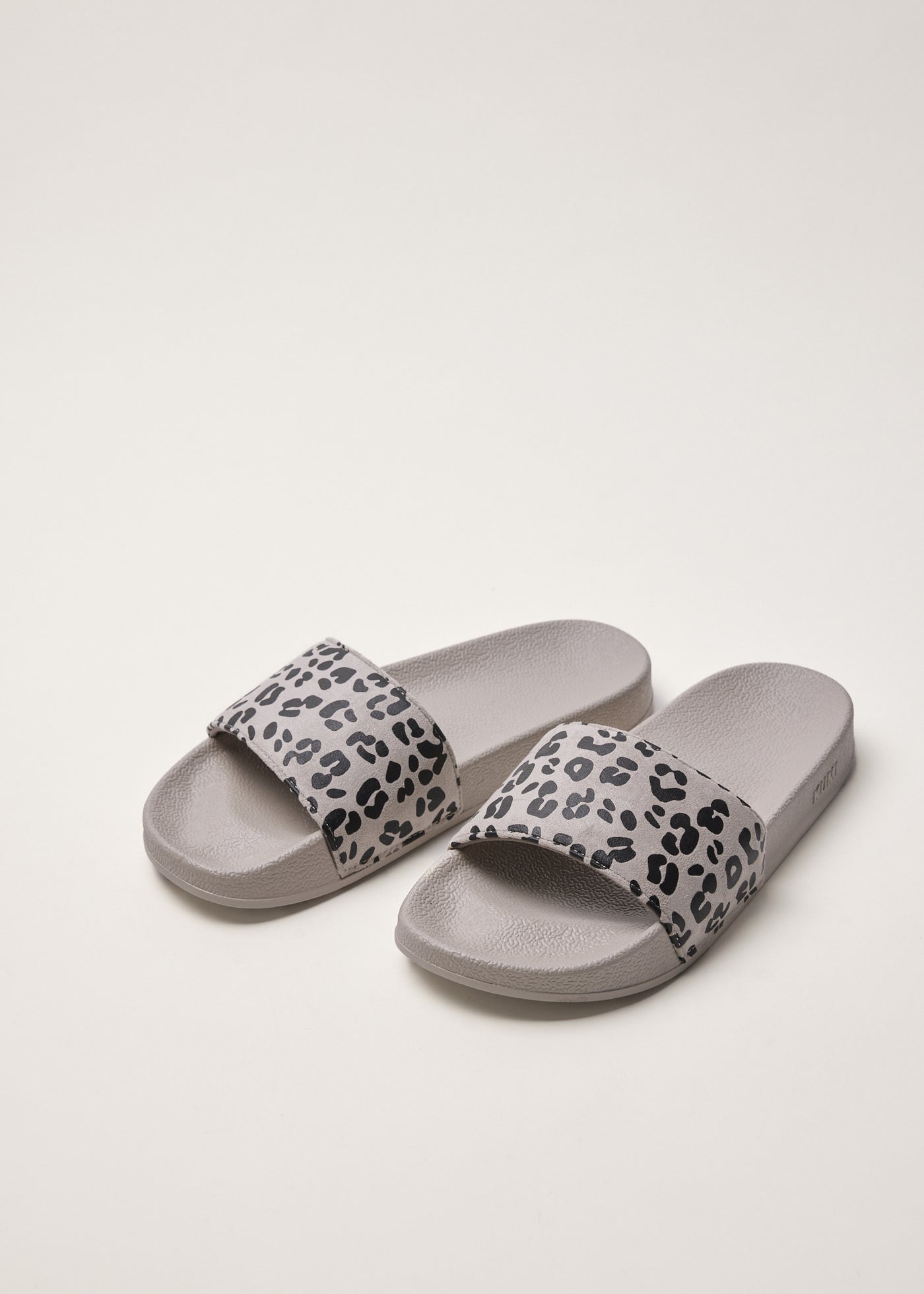 Off white leopard slides