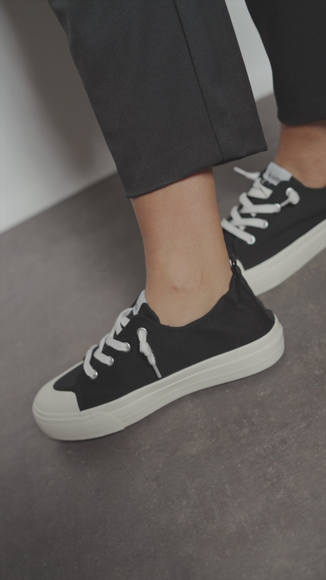 Black platform slip-on sneakers
