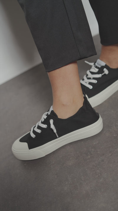 Black platform slip-on sneakers