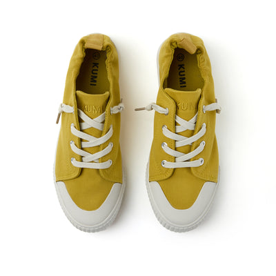 Yellow slip-on sneakers