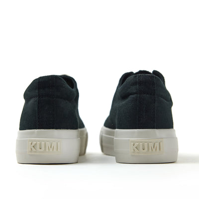 Black platform sneakers