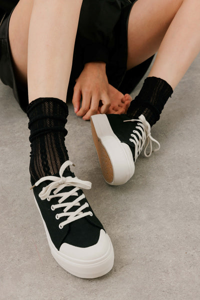 Black platform sneakers